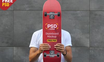Hand Holding Skateboard Mockup PSD Template Free Download