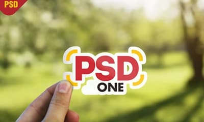 Hand Holding Sticker Mockup PSD free download